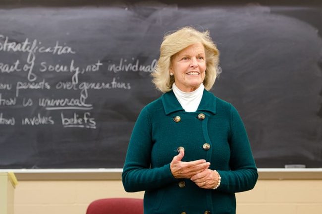 Female Professor in front of class