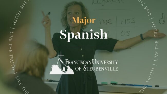 A professor teaching Spanish at a whiteboard with text “Major Spanish” and “Franciscan University of Steubenville,” with “Live the Truth” around the border.